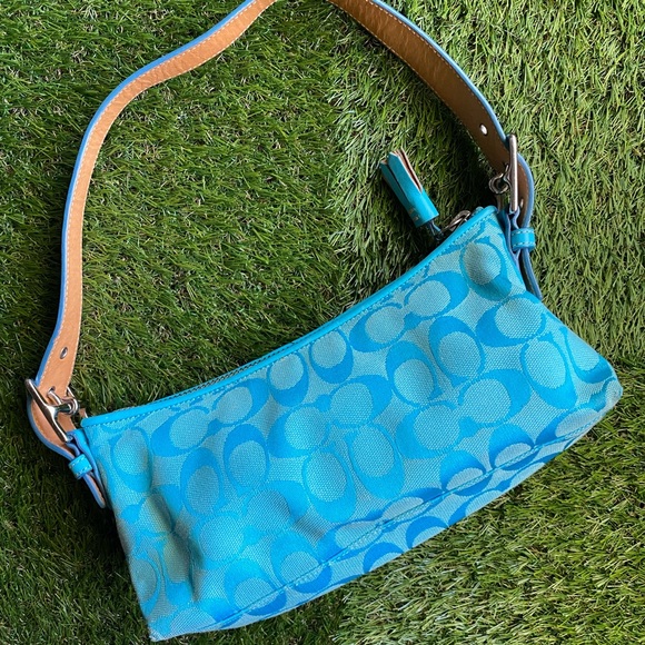 Bright turquoise Coach purse